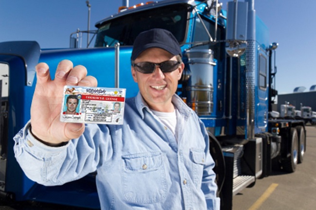 Truck Driving School In US for Foreigners - A man with CDL Card