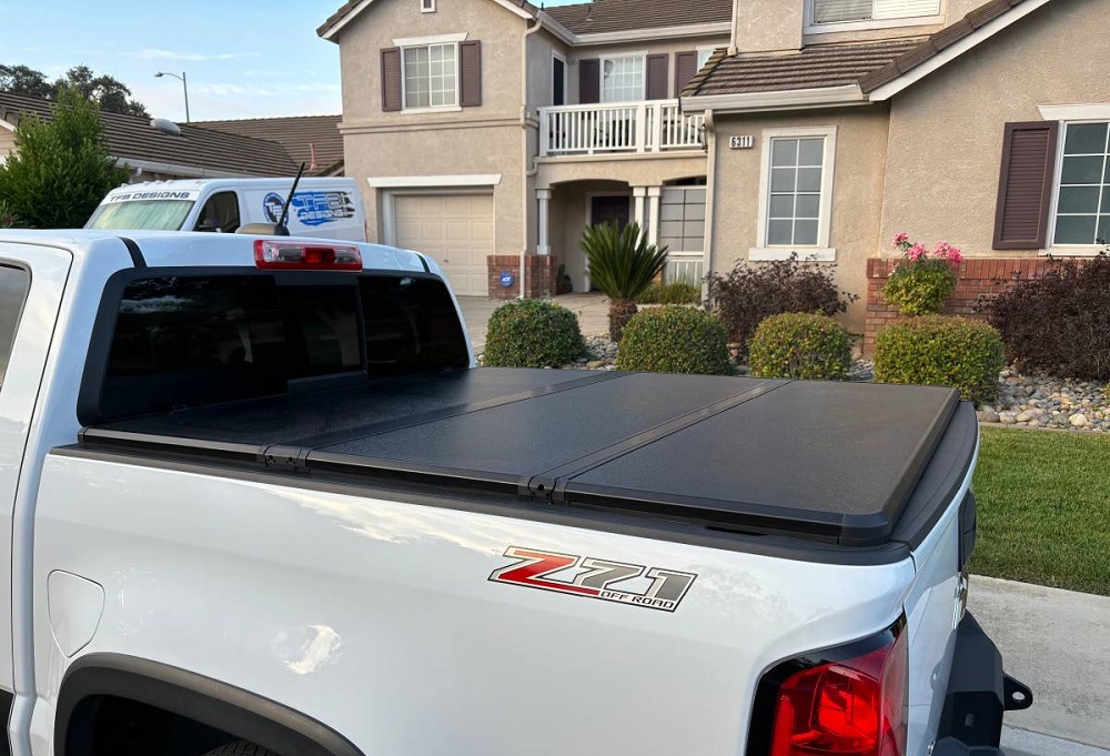 Hard folding tonneau covers for trucks