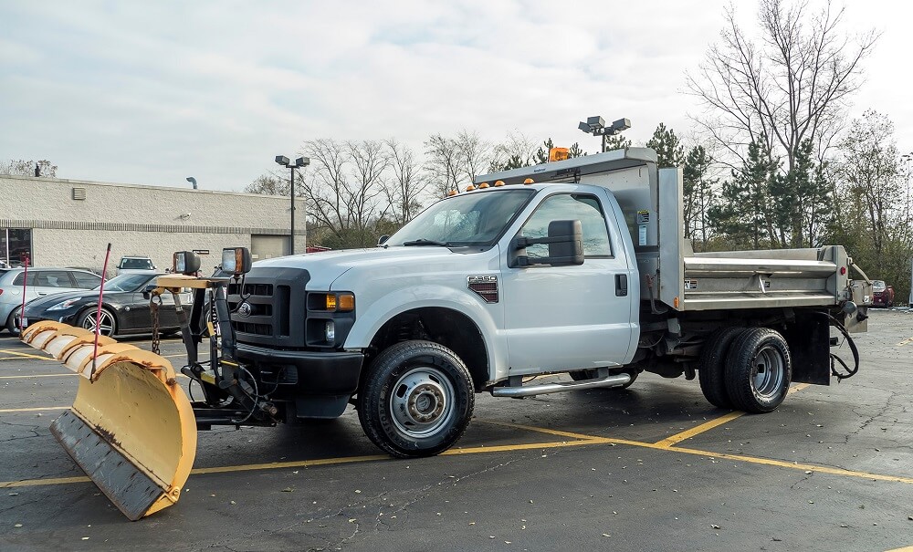 Affordable Used snow plow trucks for sale on Craigslist - Ford F-350 Super Duty with a snow plow attachment