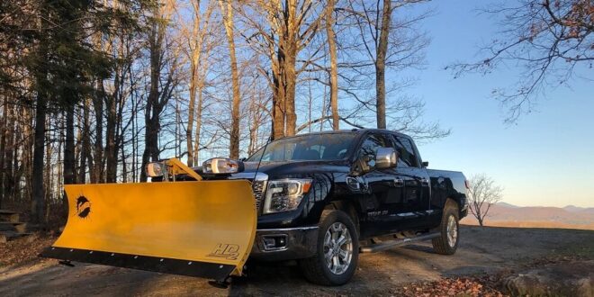Affordable Used snow plow trucks for sale on Craigslist - Nissan Titan XD with a snow plow attachment