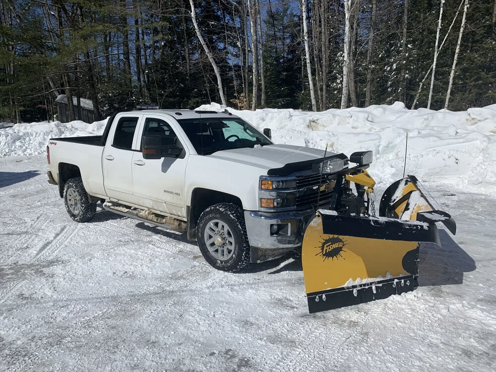 Chevrolet Silverado 2500 with a snow plow attachment